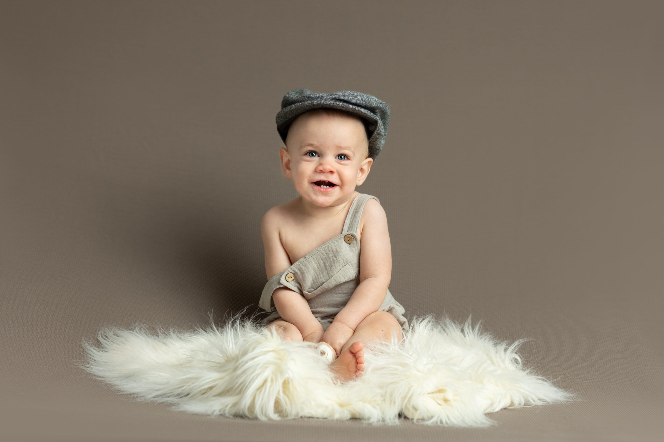 Baby Boy in newsboy hat for Milestone Photo Session in Cumming, Ga