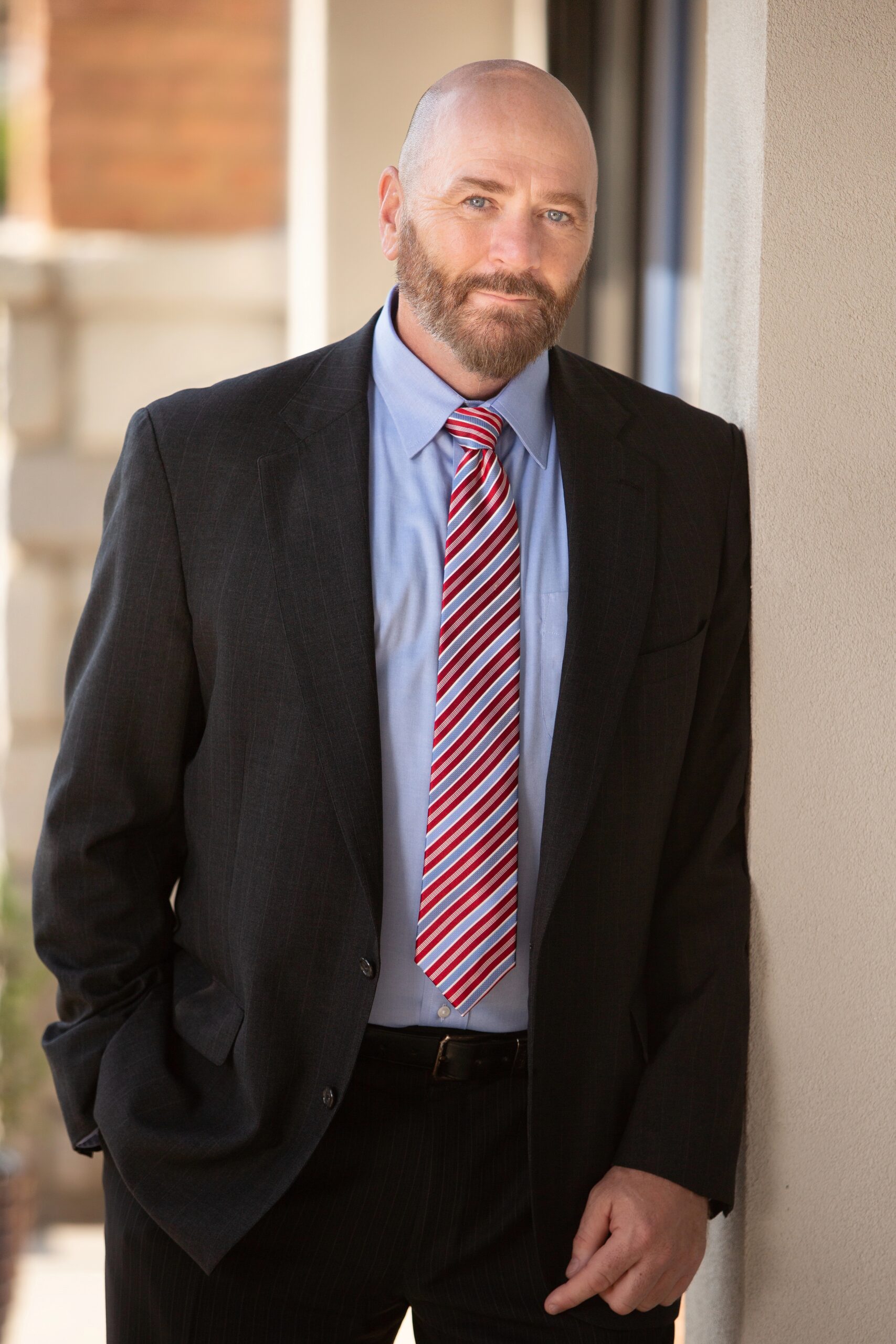 Headshot male Outdoor McLemore hands posed in lap with wrists crossed