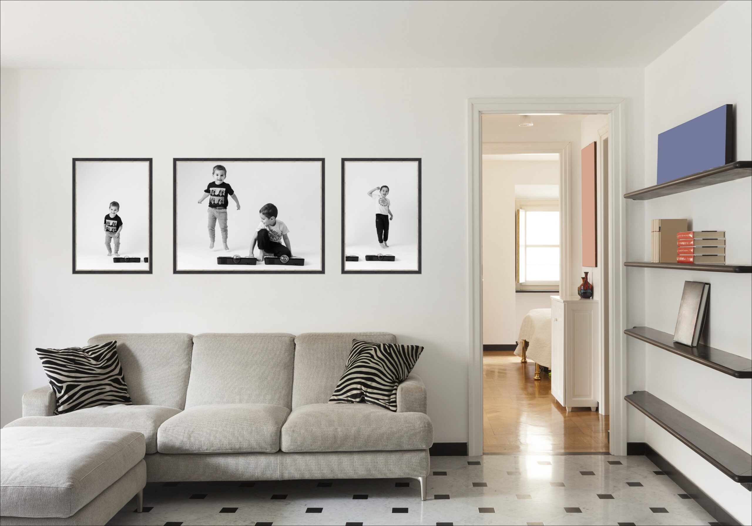 Room with large wall art display by Children's Photographer Colleen Hight of two boys dancing