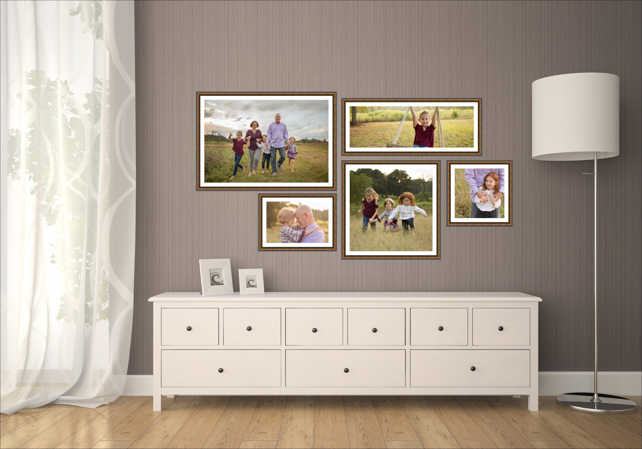 Wall display of family portraits from a family session with Colleen Hight Photography